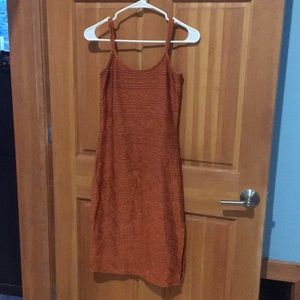 Spaghetti strap sundress with Aztec embellishment.